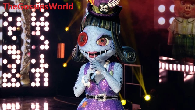 Who Was Behind The Doll Costume On The Masked Singer?